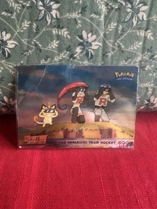 1998 Topps Pokemon Movie Mewtwo Strikes Back #12 The Nefarious Team Rocket Holo - Photo 1 sur 2