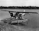 A. J. Mcclane Exits A Sea Plane Onto A Small Wooden Dock 1970 Old Fishing Photo