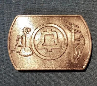 RARO✨️DE COLECCIÓN. Hebilla de cinturón, diseño de liniero de The Bell Telephone Company✨️estaño sólido Foto 1 de 4