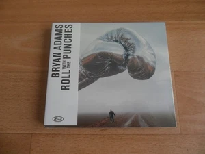 BRYAN ADAMS - ROLL WITH THE PUNCHES (SEALED DELUXE 18 TRACK NEW 2 X CD ALBUM) - Picture 1 of 8