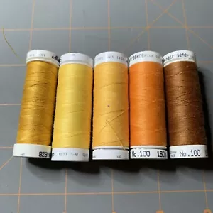 LOT 5 different Mettler Metrosene Thread Yellow Gold Orange - Picture 1 of 2