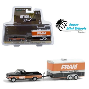 Greenlight 1:64 Hitch & Tow - 1994 Ford F-150 XLT & FRAM Oil Enclosed Car Hauler - Picture 1 of 2