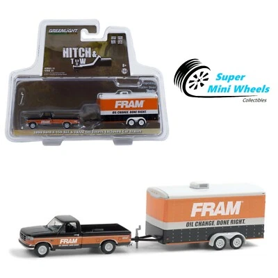 Greenlight 1:64 Hitch & Tow - 1994 Ford F-150 XLT & FRAM Oil Enclosed Car Hauler - Image 1 of 2
