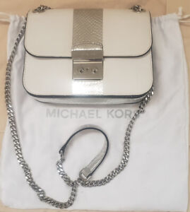Michael Kors crossbody white /silver Preowned in good condition.