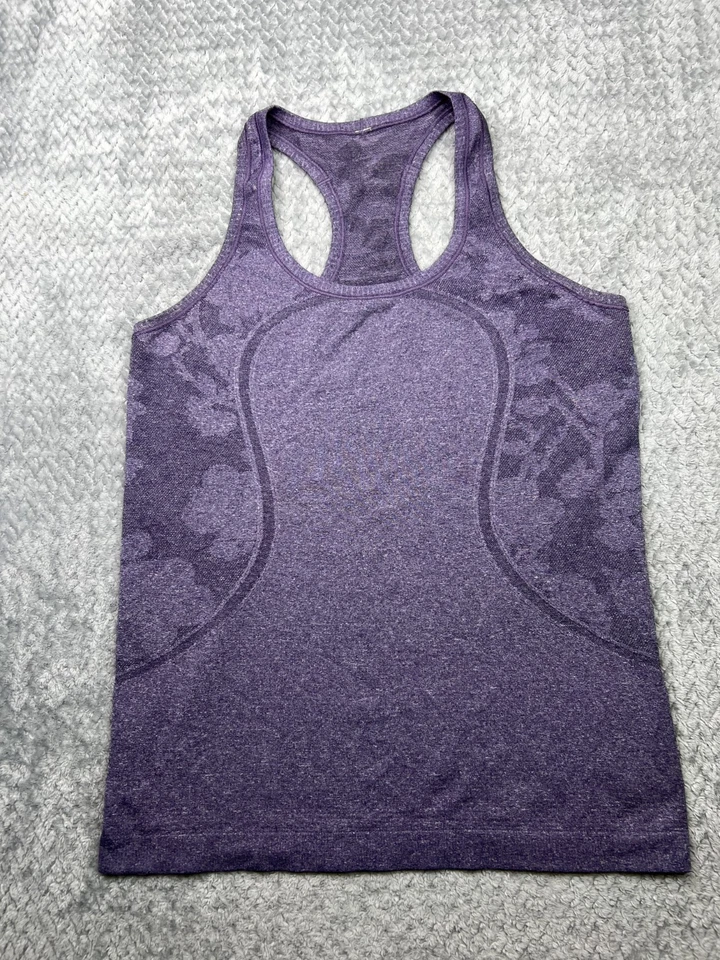 Camiseta sin mangas deportiva Lululemon Run Swiftly Tech para mujer talla 10 patrón camuflado púrpura Foto 1 de 4