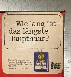 GUINNESS WIE LANG IST DAS LANGSTE HAUPTHAAR 3,5 ZOLL QUADRATISCHER BIERUNTERSETZER - Bild 1 von 2