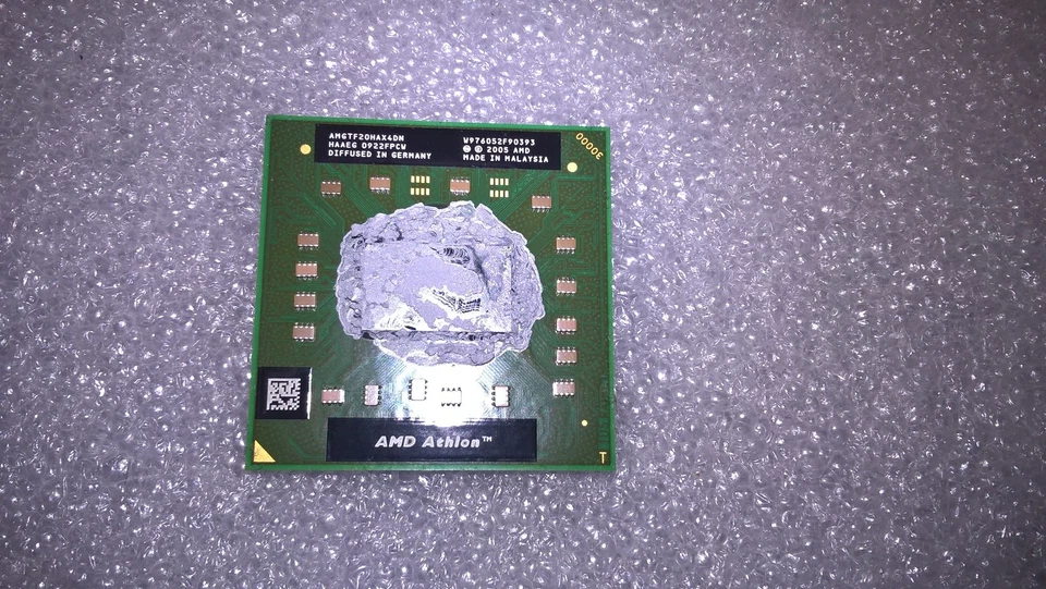 Processore AMD Athlon 64 TF-20 Mobile AMGTF20HAX4DN 1.6Ghz Socket S1 (S1g1) - Immagine 1 di 1