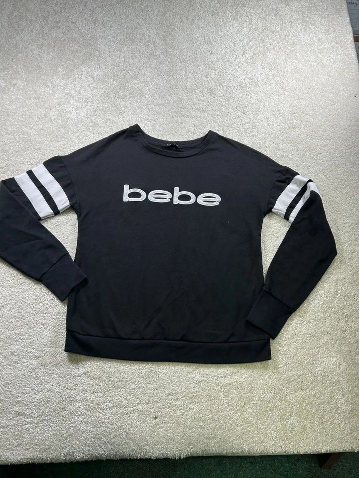 Sudadera deportiva Bebe para mujer mediana negra blanca manga a rayas pulóver cuello redondo Foto 1 de 4