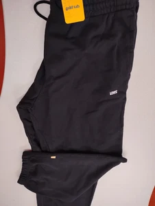 PANTALONES DEPORTIVOS AUTÉNTICOS LEVI'S CLASSICS 100% ALGODÓN CON PUÑOS A37820000 - Imagen 1 de 1
