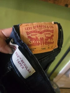 Levi's 502 Boys' Dark Blue Regular Stretch Tapered-Leg Casual Jeans Size 12 - Picture 1 of 3
