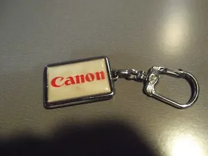 Sammlerstück Schlüsselanhänger Metall 1,5" Zoll Canon - Bild 1 von 5
