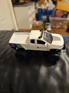 Maisto 2017 Chevrolet Colodado ZR2 Pickup Truck, White "PEAK Suspension" 1:48  - Picture 1 of 18