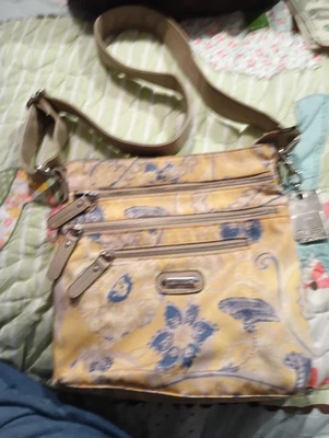 Tyler Rodan Kansas crossbody bag in a yellow and blue paisley print - Image 1 of 4