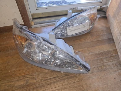 Headlights Assembly for 2002-2004 Toyota Camry Chrome Amber Corner Headlamp Pair - Image 1 of 4
