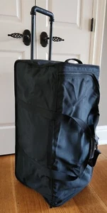 TUMI Black Large Two Wheel Traveling Duffle Bag Numerous Pockets - Picture 1 of 20