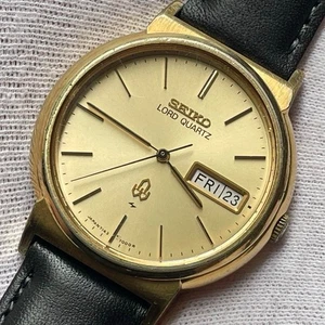 Reloj de cuarzo para hombre SEIKO Lord Quartz 7143-7000 vintage 1979 dorado día fecha Japón - Imagen 1 de 12