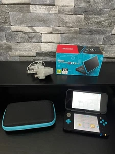 Nintendo NEW 2DS XL Handheld Konsole Schwarz & Türkis OVP mit Case - Bild 1 von 13