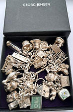 Georg Jensen Genuine Solid Silver x 27 Charm Bracelet. 108 Gram .Boxed