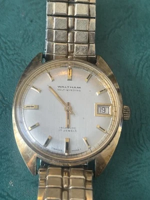 Waltham 17 Jewel Incabloc relógio masculino data automática corda automática tom dourado suíço - Imagem 1 de 4