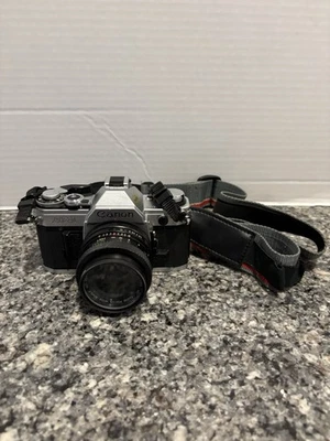 Cámara fotográfica Canon AE-1 35 mm con lente Vivitar 49 mm / correa / probada funciona leer Foto 1 de 4