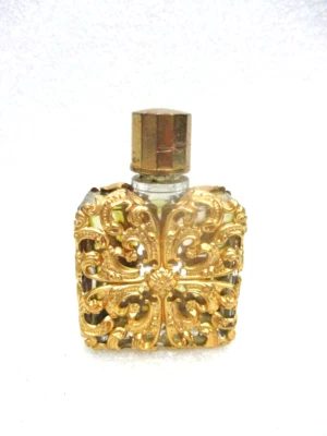 Ancienne petite fiole à parfum en verre et laiton ouvragé " Coryse Salome " - Photo 1/3