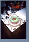 FOUND COLOR PHOTO J_1850 VIEW OF PRETTY ROUND CAKE ON TABLE
