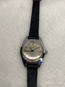 Reloj Timex eléctrico vintage para mujer plateado con correa negra no probado - Imagen 1 de 4