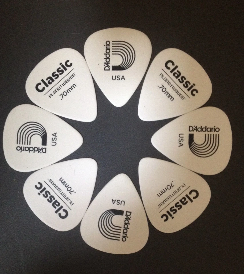  Paquete de 10 selecciones de celuloide D'Addario Planet Waves clásicas de 0,70 mm medianas Foto 1 de 1