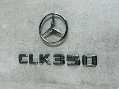 Mercedes-Benz W209 CLK350 Carbon Fiber Effect Rear Trunk Emblem Pair OEM Star - Image 1 of 4