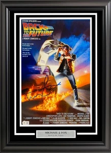 MICHAEL J. FOX AUTOGRAPHED FRAMED BACK TO THE FUTURE MOVIE POSTER BECKETT 236451 - Picture 1 of 6