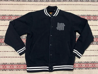 Chaqueta universitaria invicta talla L Foto 1 de 3