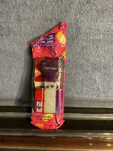 Pez Valentine Herz-, lila Herz, weißer Stiel mit Herzen, neuwertig im Beutel - Bild 1 von 3