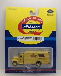 HO Athearn RTR #91833 Fire Protection District Mack Rescue Truck - Rescue 214 - Picture 1 of 6
