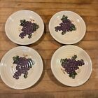 four small plates grape design