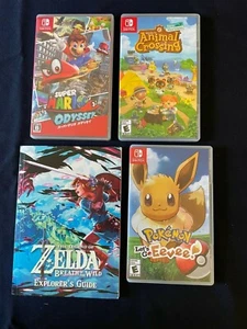 Nintendo Switch Lot 3 games & LoZ BoW Explorer Guide; ACNH, Let's Go Evee, more - Picture 1 of 2