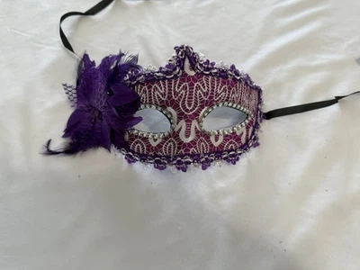 Purple Masquerade Mask With Feathers And Flowers Tie On Mardi Gras - Image 1 of 3