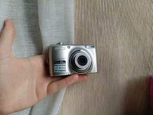 🔥Cámara compacta digital Nikon CoolPix L23 plateada 10,1 MP🔥Juego completo funcionando🔥 - Imagen 1 de 7