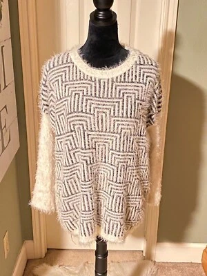 Suéter Velzera negro y crema talla única  Foto 1 de 4