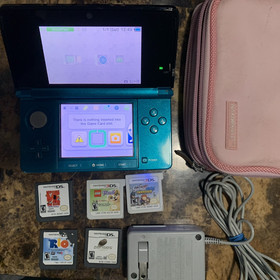 Nintendo 3DS Handheld System Aqua Blue 5 Games Charger 2GB Memory Card Case