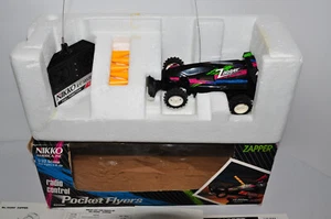 Vintage Nikko Pocket Flyers Remote Control (RC) Electric 1:32 Zapper - Working - Picture 1 of 7