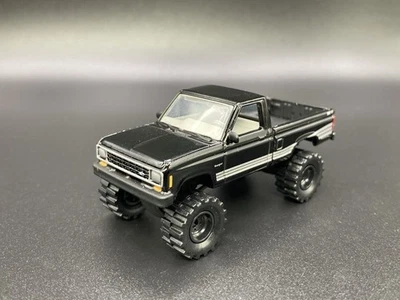 1987 Ford Ranger Lifted 4x4 Truck 1/64 Diecast Custom Johnny Lightning Pickup - Image 1 of 4