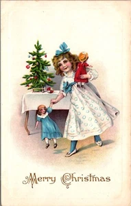 Christmas Postcard Little Girl Playing with Dolls Decorated Tree - Picture 1 of 2