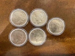 Lot of 5 1922-1935 Peace Dollars Coins - Uncirculated Mixed Year 90% Silver - Picture 1 of 2