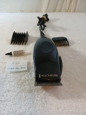 Remington Hair Clipper Black .MODEL HC 60 With 2 Clipper Attachment  USED - Image 1 of 4