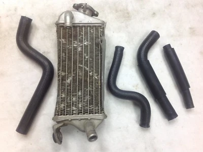 Radiador Kawasaki KX85 2003 con mangueras y tapa del radiador Foto 1 de 4