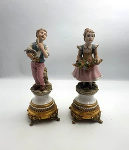 Pair of Porcelain Capodimonte Boy & Girl holding birds / flowers Putti Figures - Picture 1 of 17