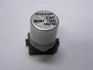 10 Nichicon UUN2A330MNR1MS 33uF 100 V 20 % SMT Elektrolytkondensatoren - Bild 1 von 1