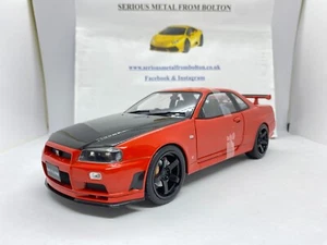 SOLIDO 1804305 1999 NISSAN SKYLINE GT-R (R34) ROSSO/NERO 1:18 - Foto 1 di 12