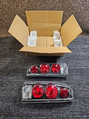 (CANTIDAD 2) Luces traseras estilo 3D negras Anzo EE. UU. 211019 para Cadillac Escalade 99-00 Foto 1 de 4