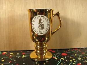 "March for MacArthur 70" Goldtone Ceramic Irish Coffee Mug with Scotsman Artwork - Picture 1 of 5